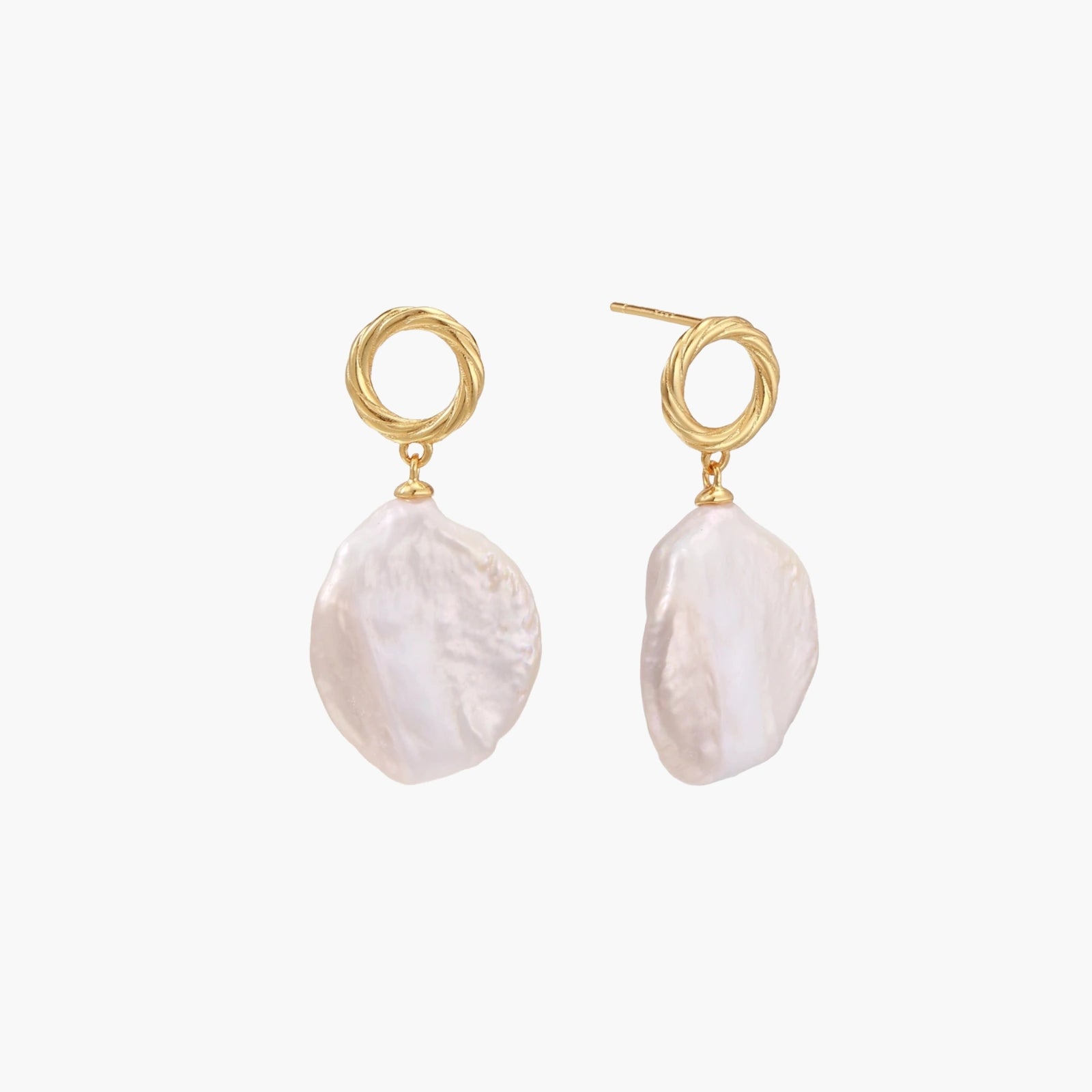 18K gold vermeil twisted circle studs with organic white baroque pearl drops on cream background