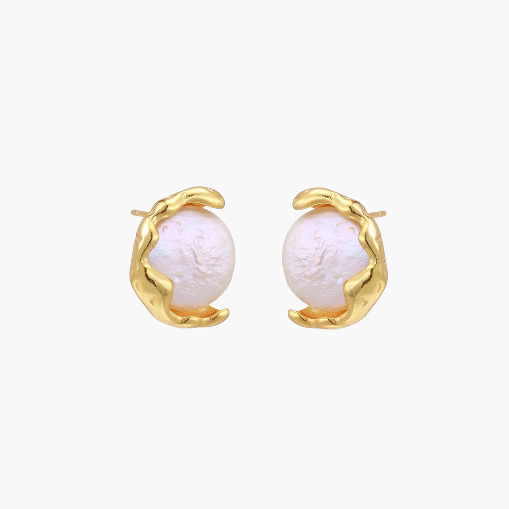 Gold vermeil studs with lustrous pink freshwater pearls in organic crescent settings