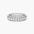Sterling silver eternity ring with continuous row of brilliant moissanite stones in scalloped crown setting with milgrain detail