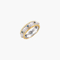 Two-tone ring with brushed silver center, gold beaded edges, and blue zirconia stones on white background.