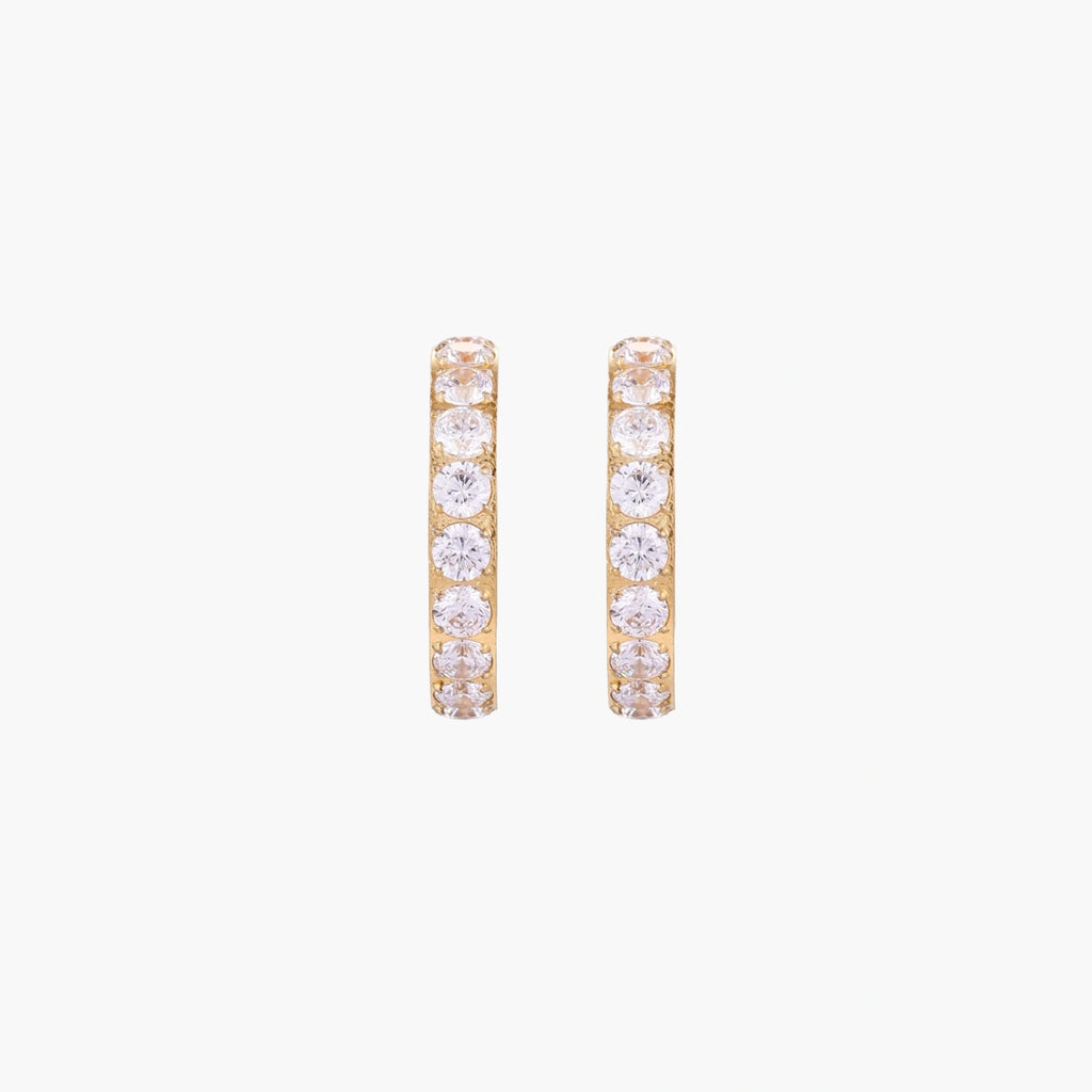 Gold pavé hoop earrings with two freshwater pearls nestled inside the curved design, featuring crystal-studded outer edge.