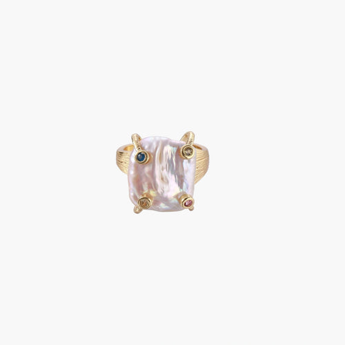 Gold ring with large iridescent baroque pearl and four colored gemstones on textured band